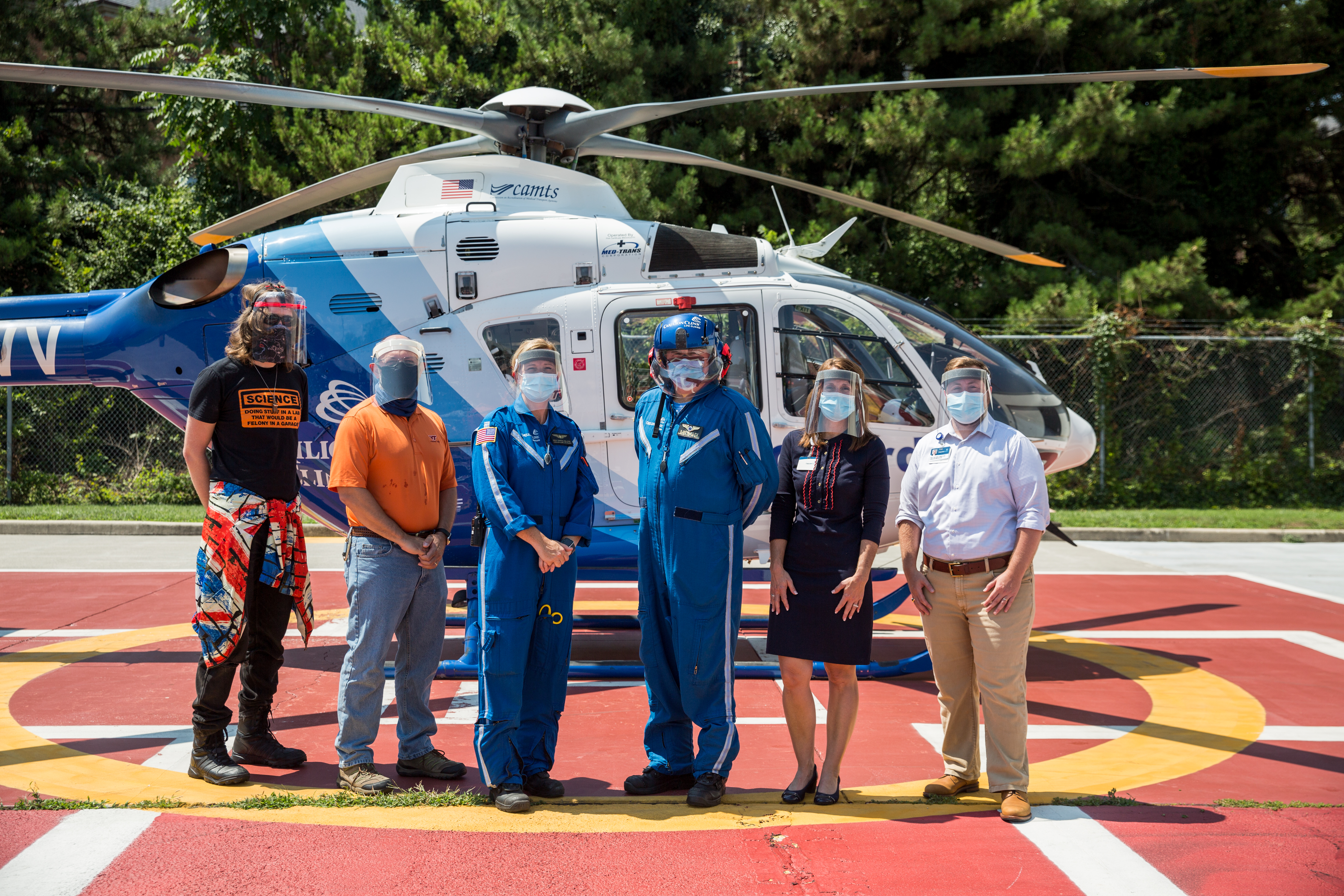 Life-Guard crew flanked by Virginia Tech engineers Liam Chapin and Dr. Alex Leonessa (left), Life-Guard Director Susan Rivers and COVID-19 Innovation's Troy Keyser (right) our COVID-19 Innovation Team members