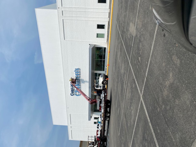 Signage being installed, July 2021