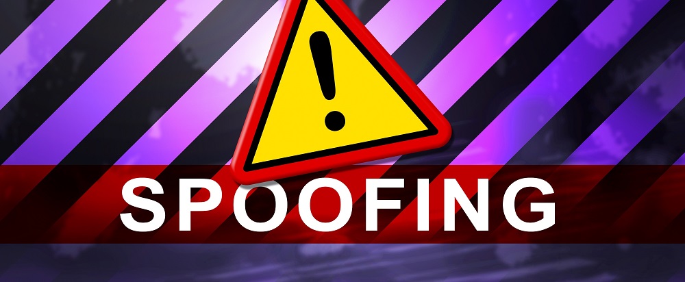 an exclamation point and the word "spoofing"