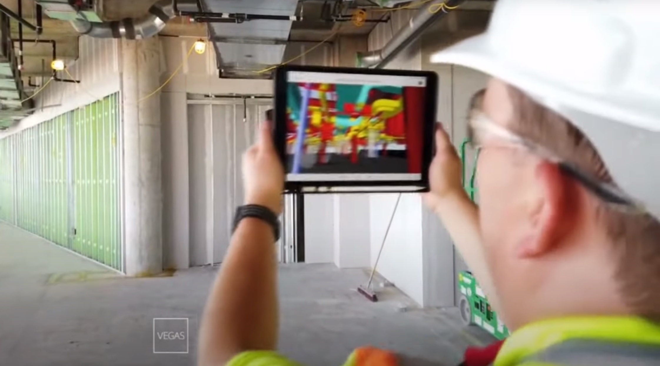 man holding a tablet