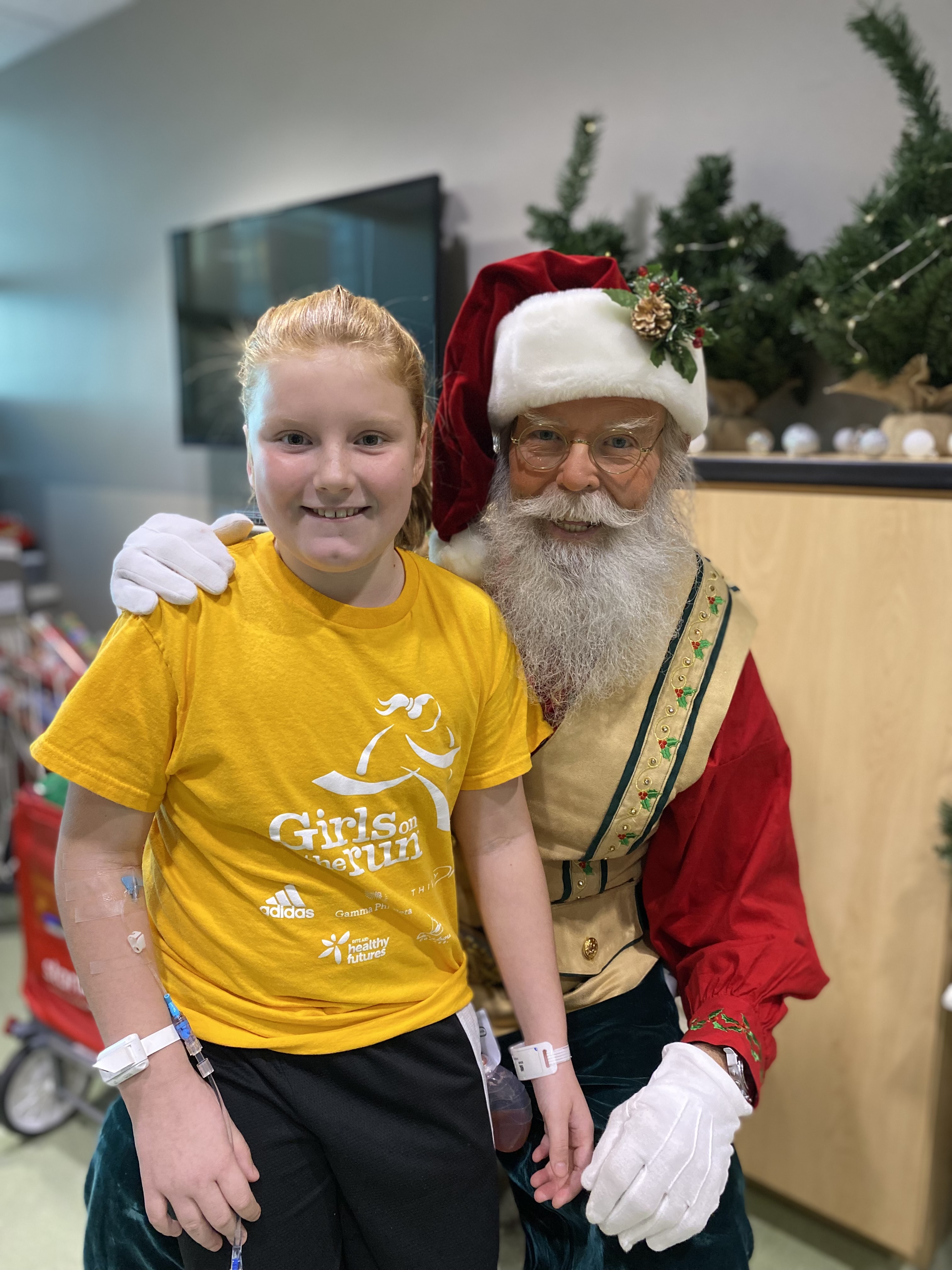 Santa visits with a pediatric patient.