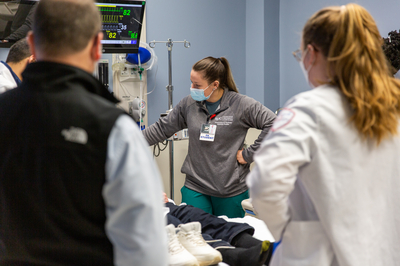 An instructor teaching medical students.