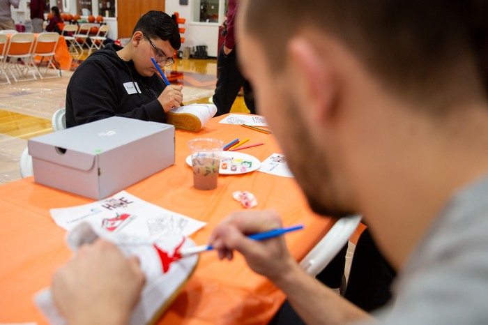 A closeup of the painting action at Virginia Tech's Hahn Hurst Basketball Practice Center.