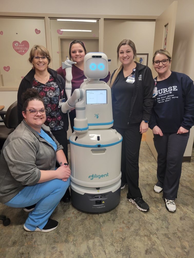 CGCH MOB staff meet one of the Moxi robots. 