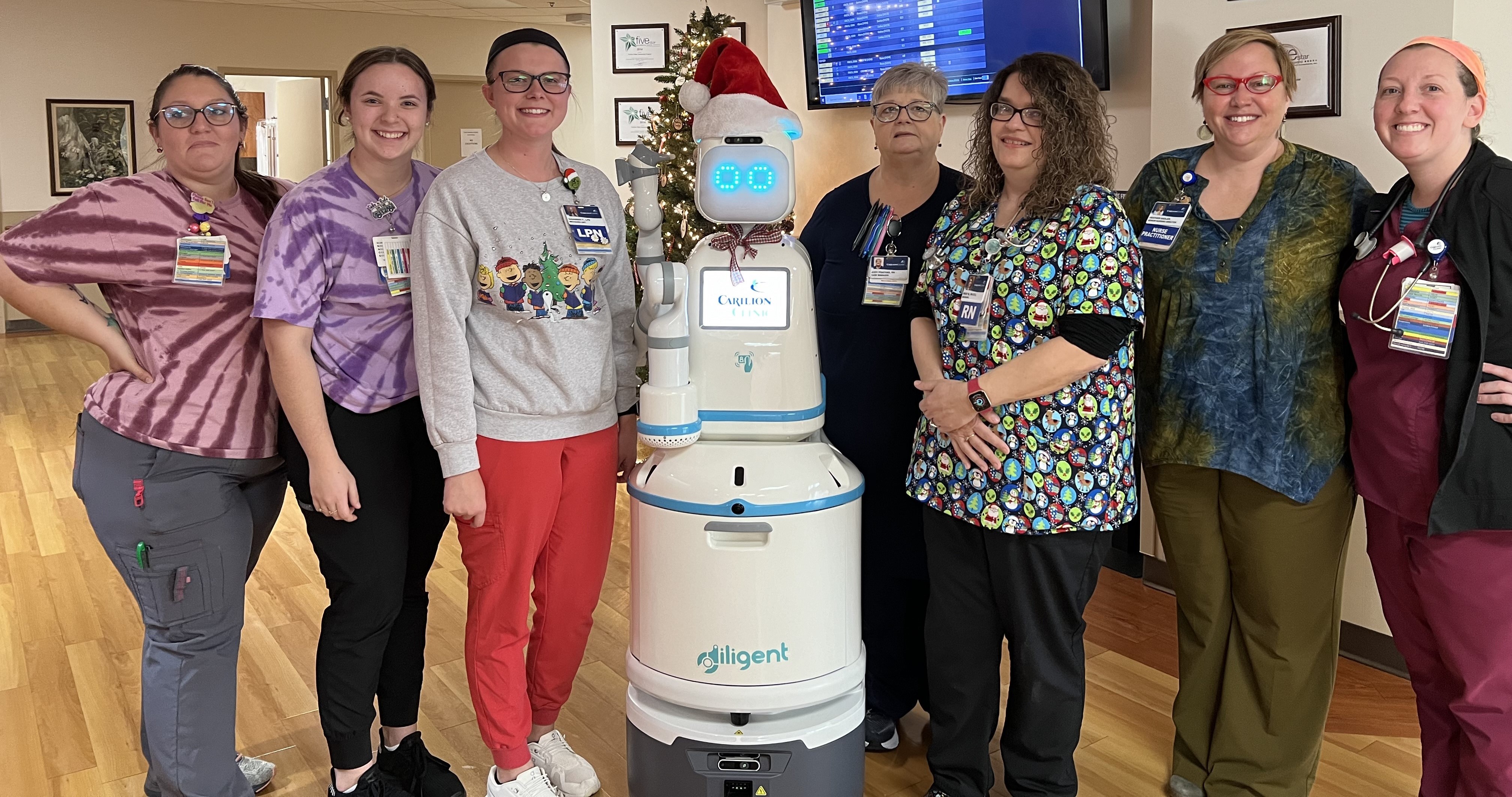 CGCH Med-Surg staff meet one of the Moxi robots. 