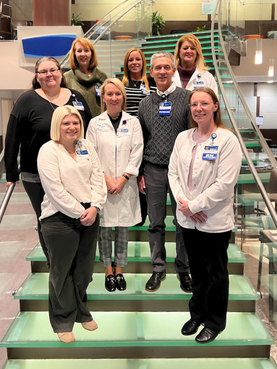 L-R, Front row: Amanda Franklin and Jennifer Evans, MSN, RN. Middle row: Cheryl Goguen; Leslie Wyatt, RN, MSN, ACNP-BC; and William Fintel, M.D. Back row: Donna Shelor, BSN, RN; Melinda Ellis, BSN, RN, OCN; and Stephanie Greathouse, MSN, APRN, FNP-C.