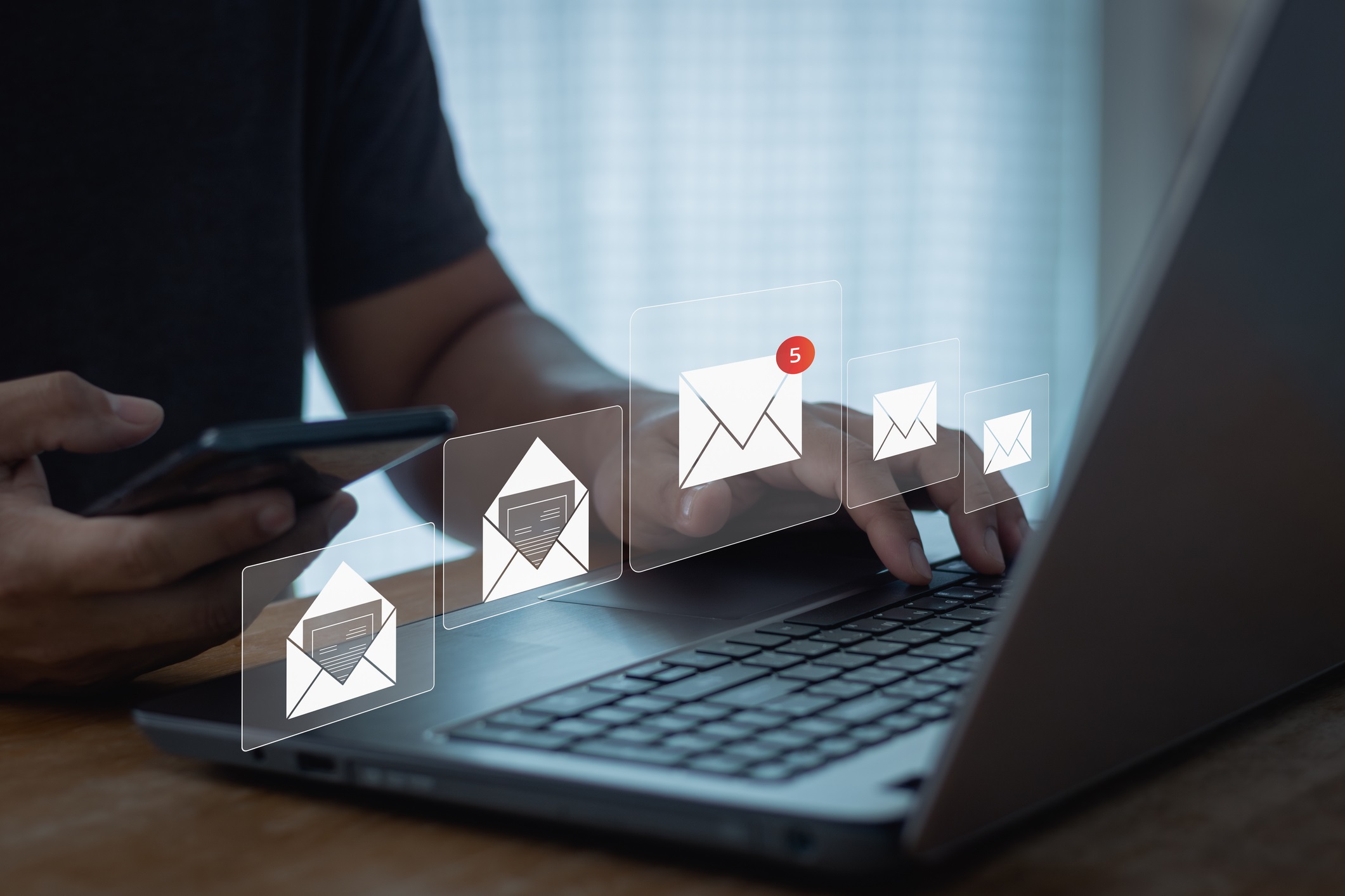 computer showing incoming emails