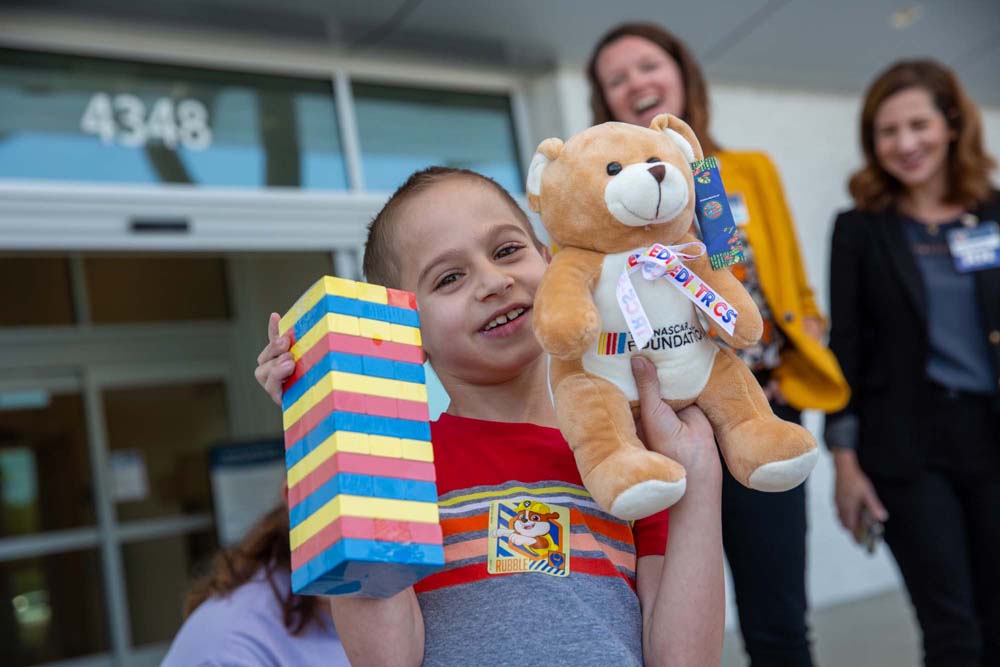 Carilion Children's patient enjoying their new Speedy Bear