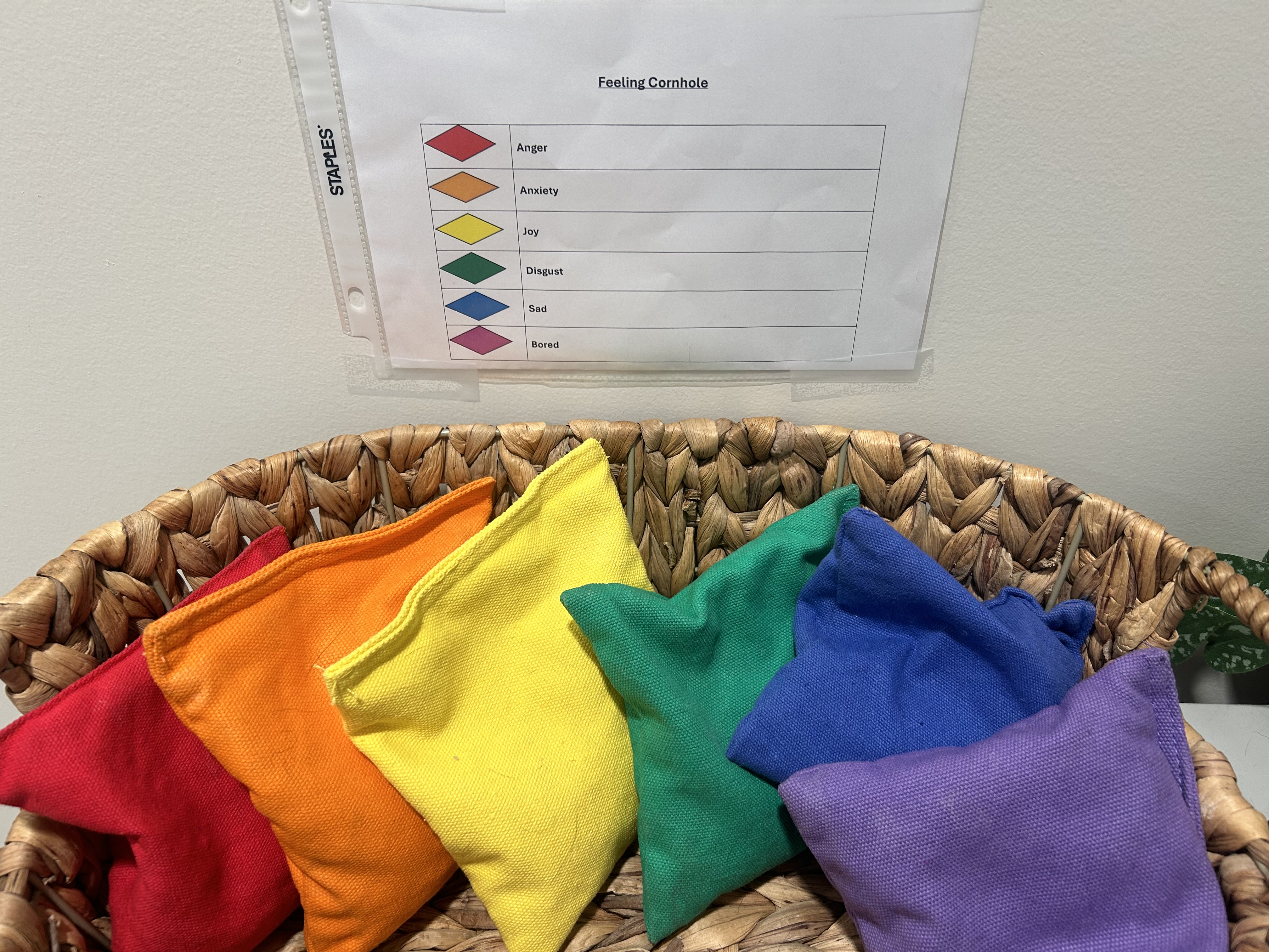 One of Wali's favorite activities is helping patients explore their emotions while playing Feeling Cornhole