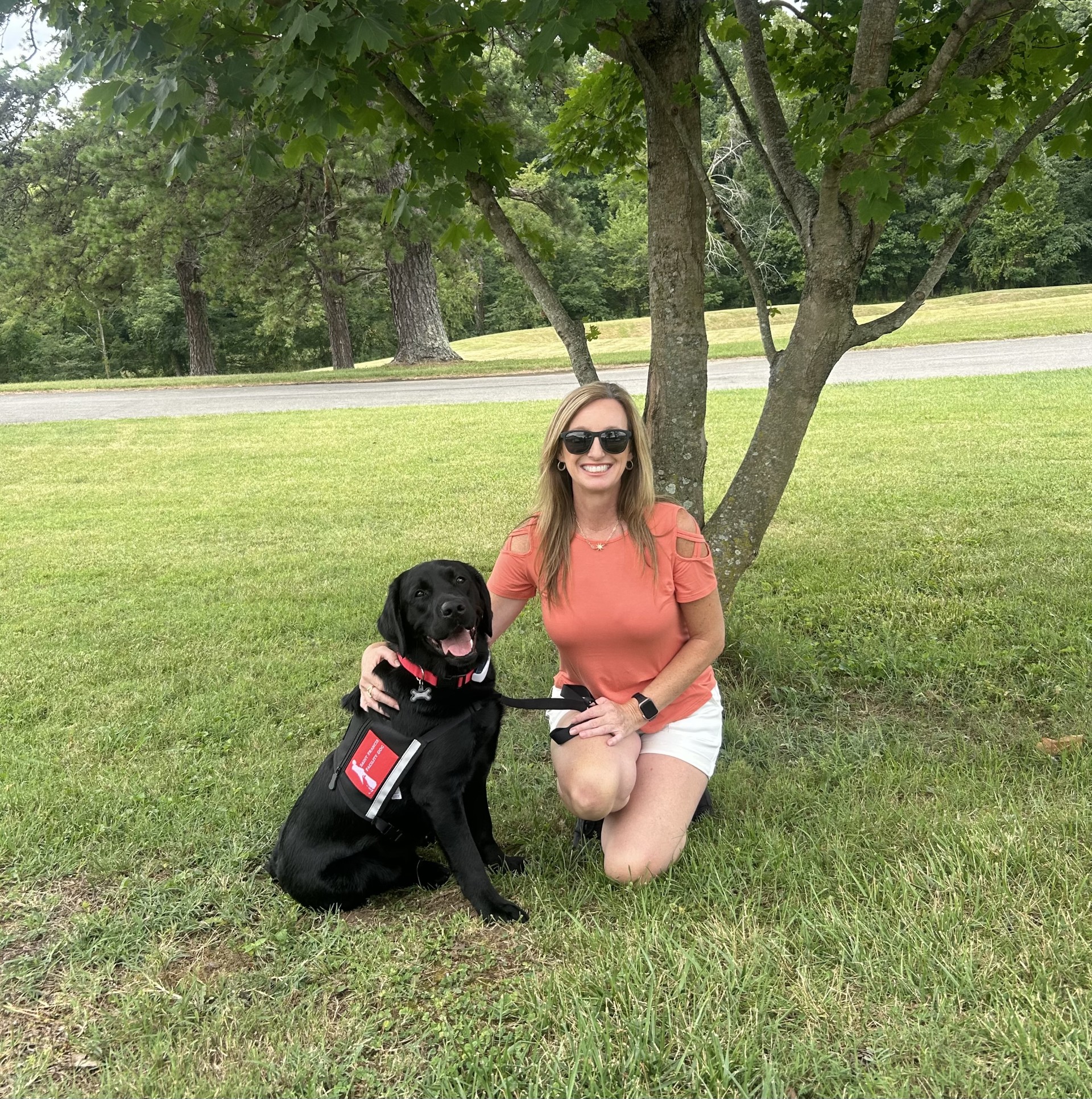 Dr. Mitchell and Wali at Saint Francis Service Dogs level III graduation