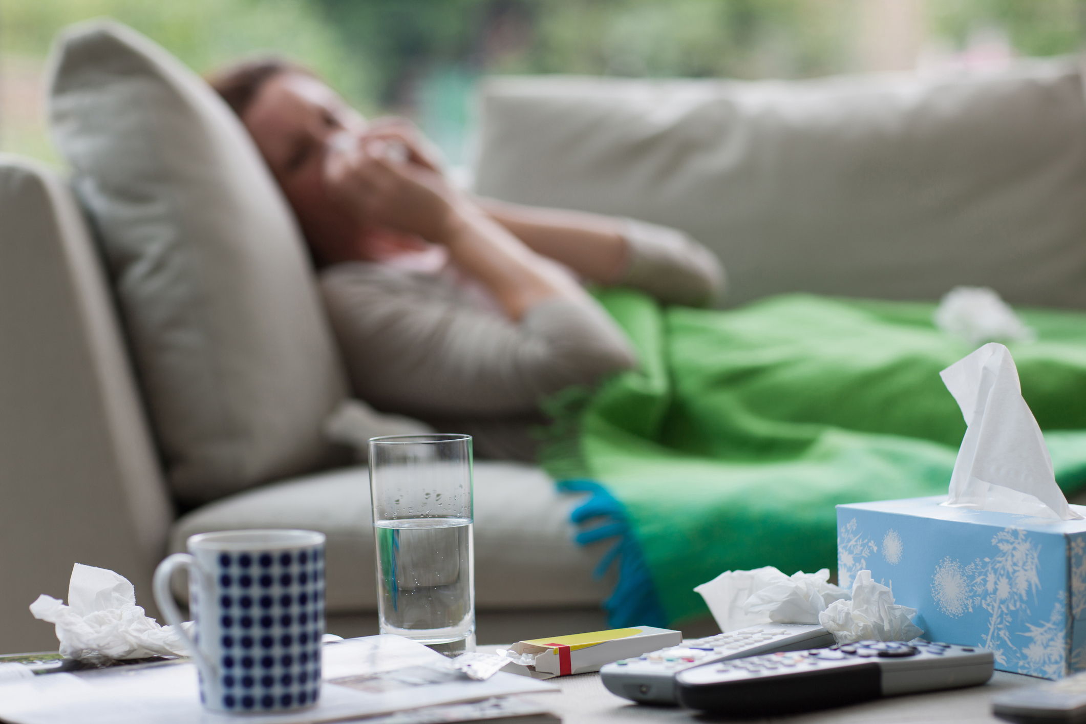 sick lady on couch