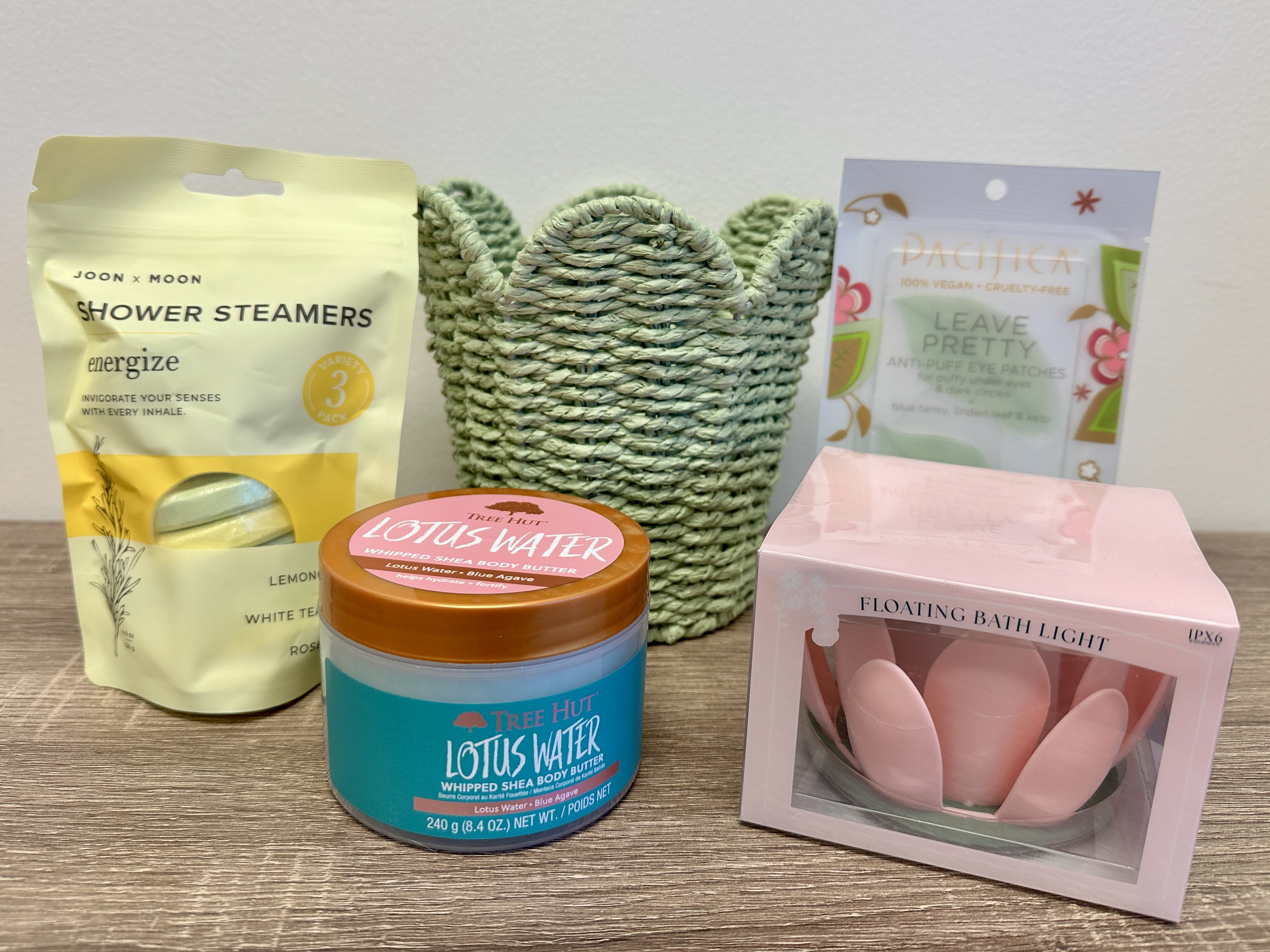 Self-Care is in the Air Kit: decorative basket, whipped shea body butter, shower steamers, floating bath light and anti-puff eye patches