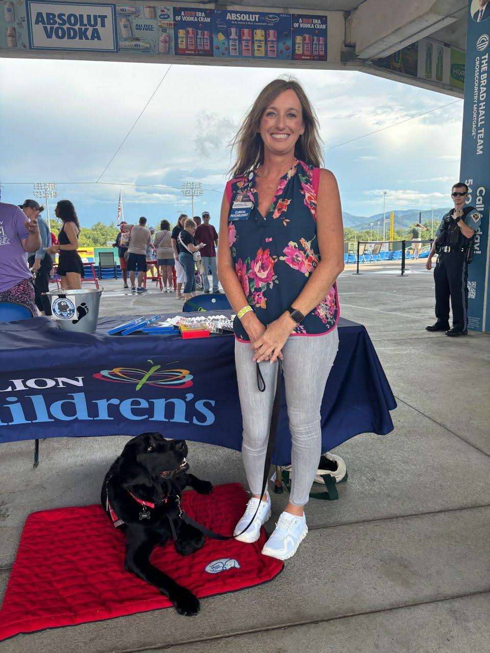 Dr. Tara Mitchell and Wali at the Salem Red Sox game
