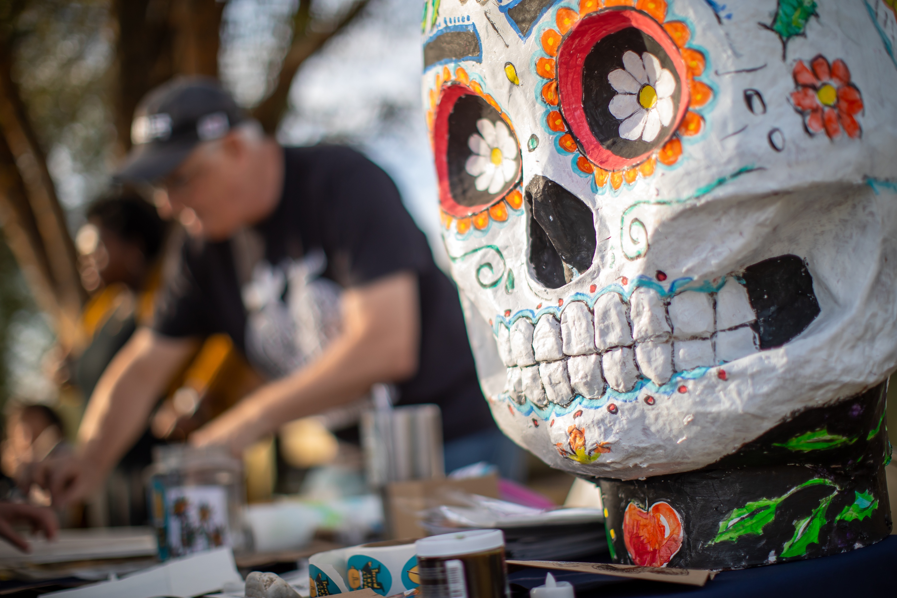 Roanoke Arts Commission artist-in-residence Brian Counihan leads Day of the Dead art activity