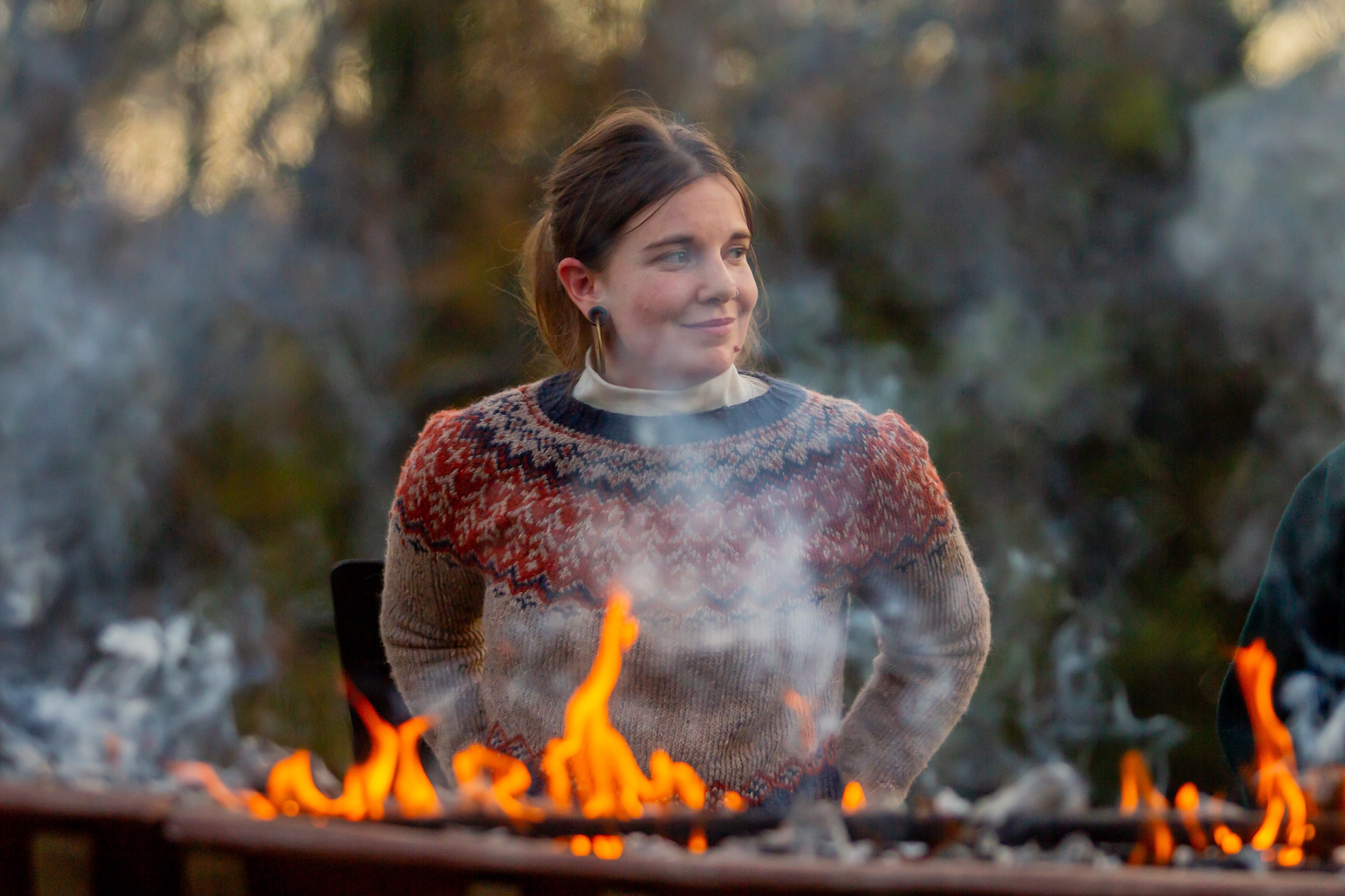 Healing Arts Program artist-in-residence Lauren Gaunt reflects during Burden Boat Ceremony