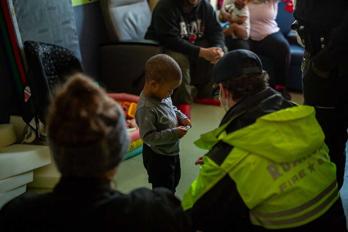First responder visits with young patient