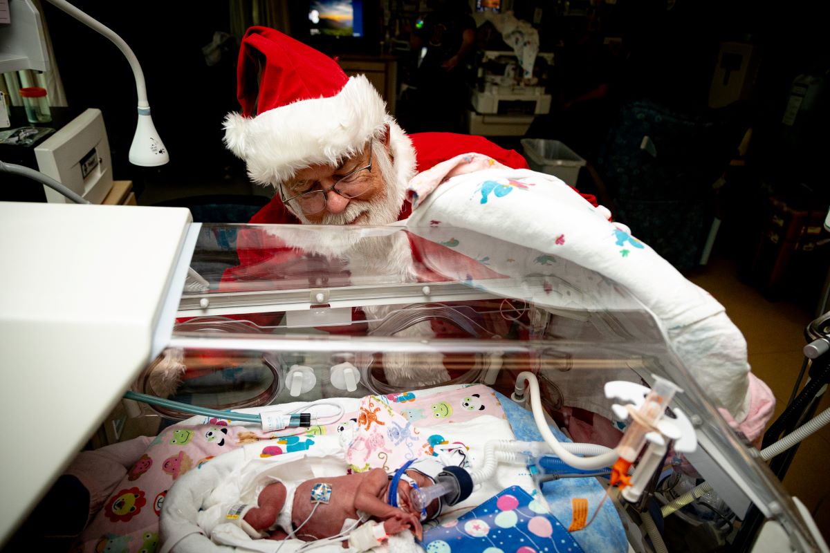 Santa peeking over patient