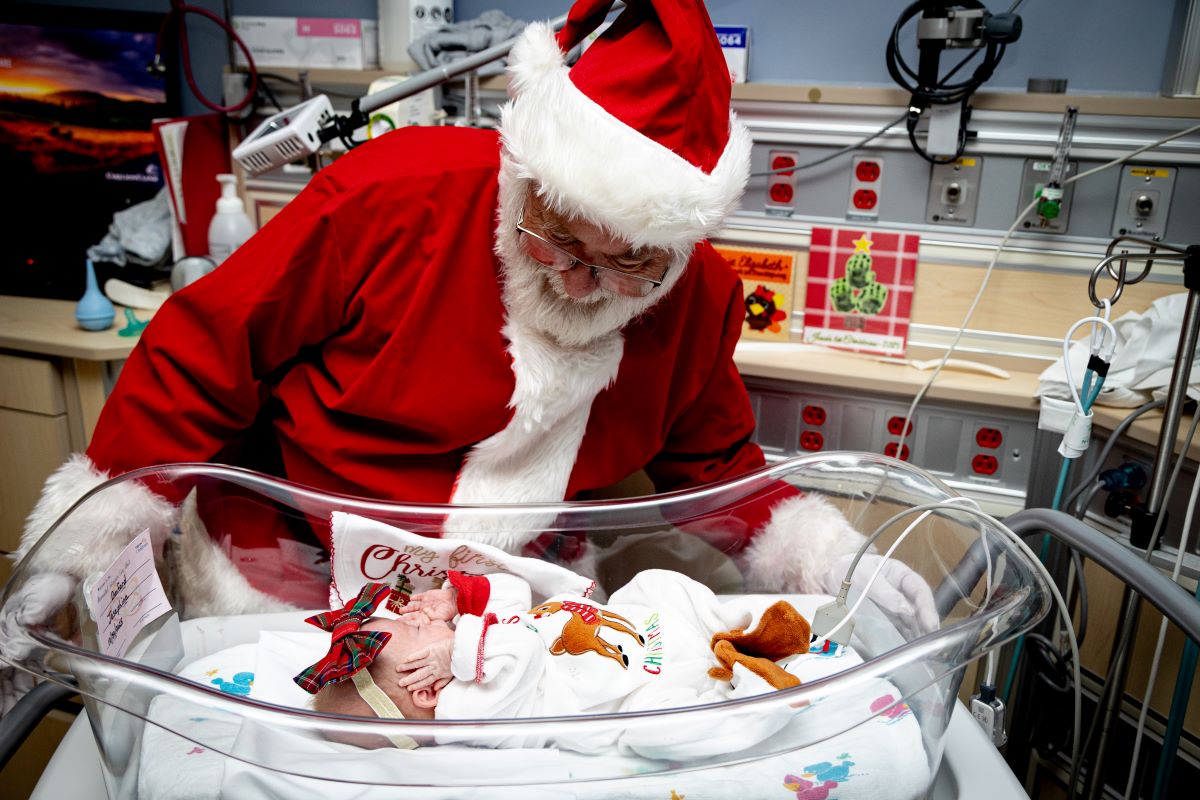 Santa visits with NICU patient