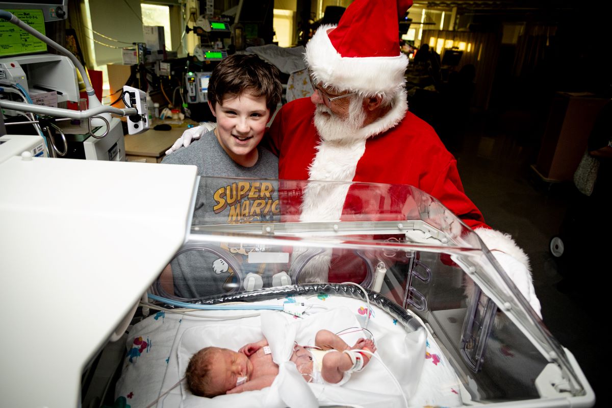 Santa with patient and big brother