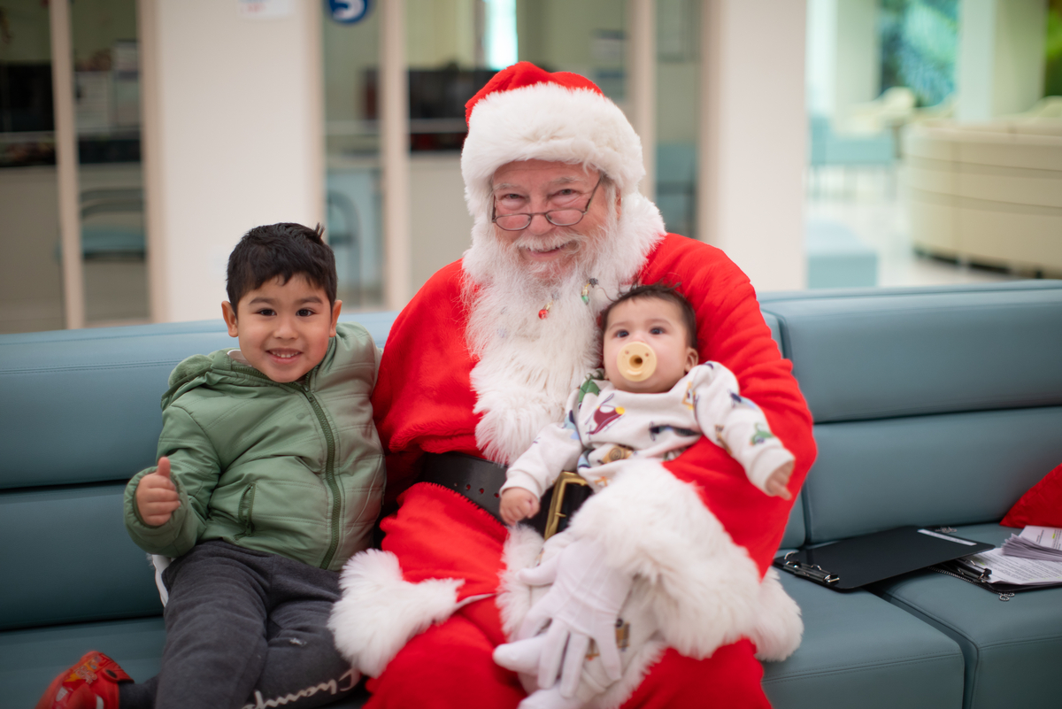 Santa visiting with patients at Tanglewood