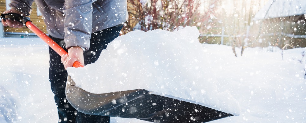 snow shovel in deep snow