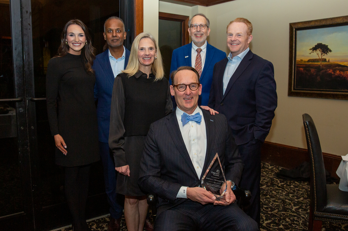 Dr. Herman, poses with Carilion leaders and Children's Miracle Network Representatives