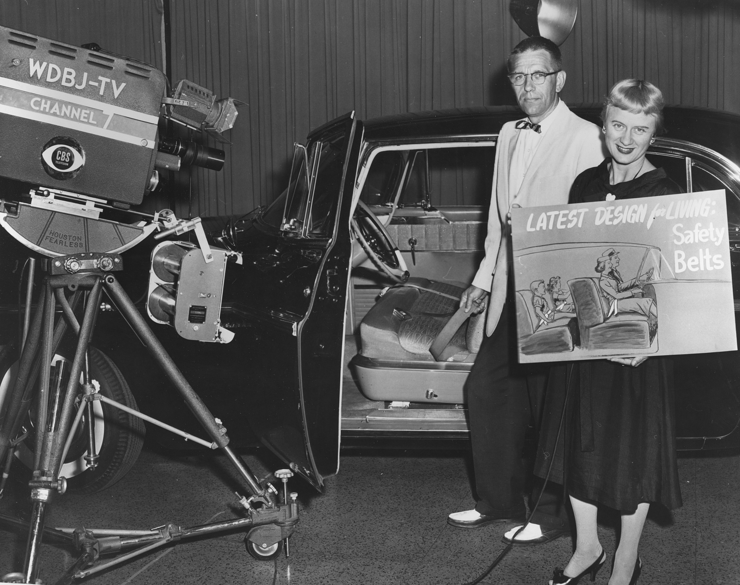 Dr. Ripley helping to educate about seatbelt safety in 1958
