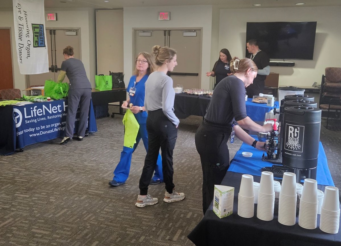 Staff visited tables at the Donate Life event.