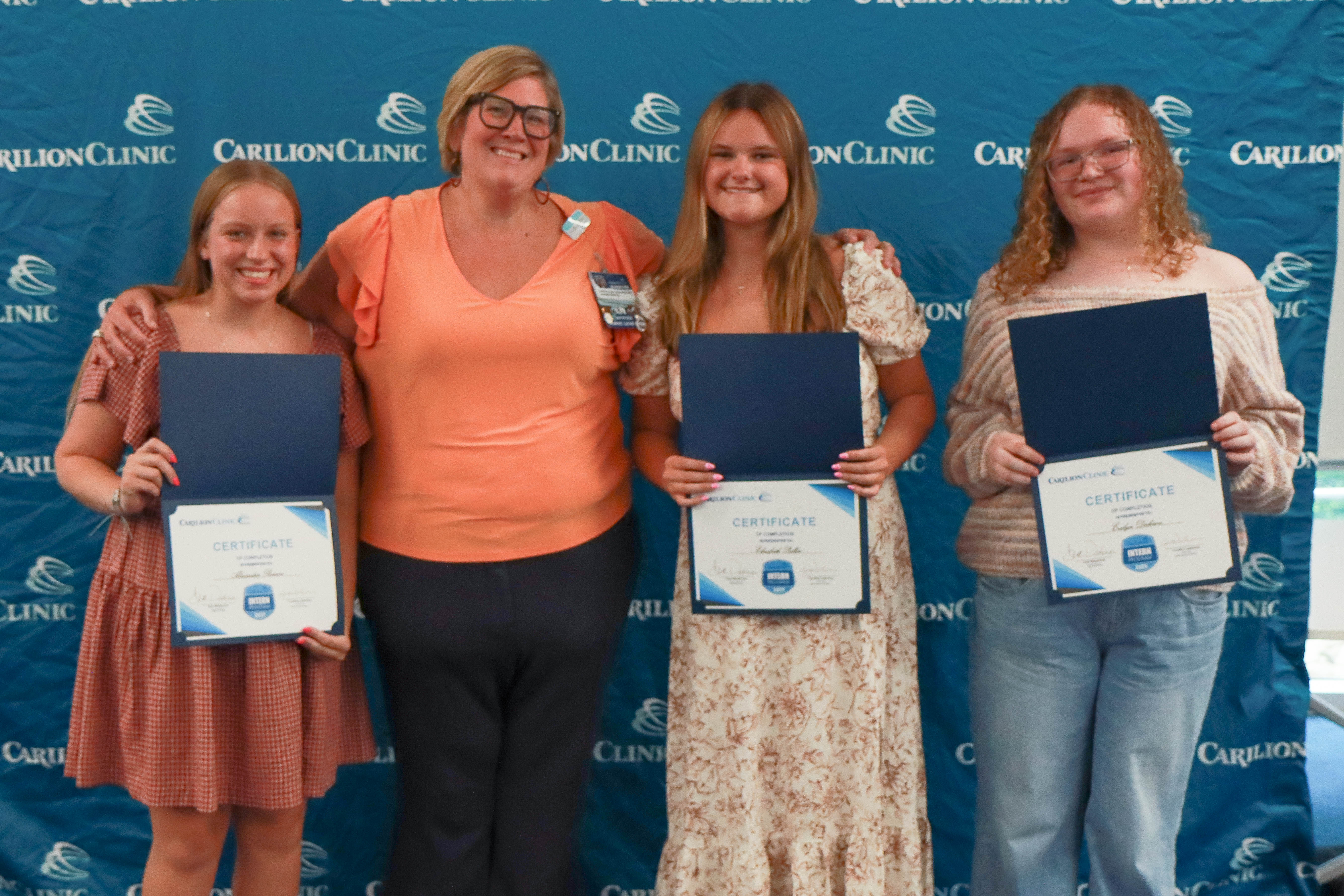 Summer 2025: Alexandria Burrow, Elizabeth McLarn Pullin, and Evelyn Dickason with their leader, Karyn Reese