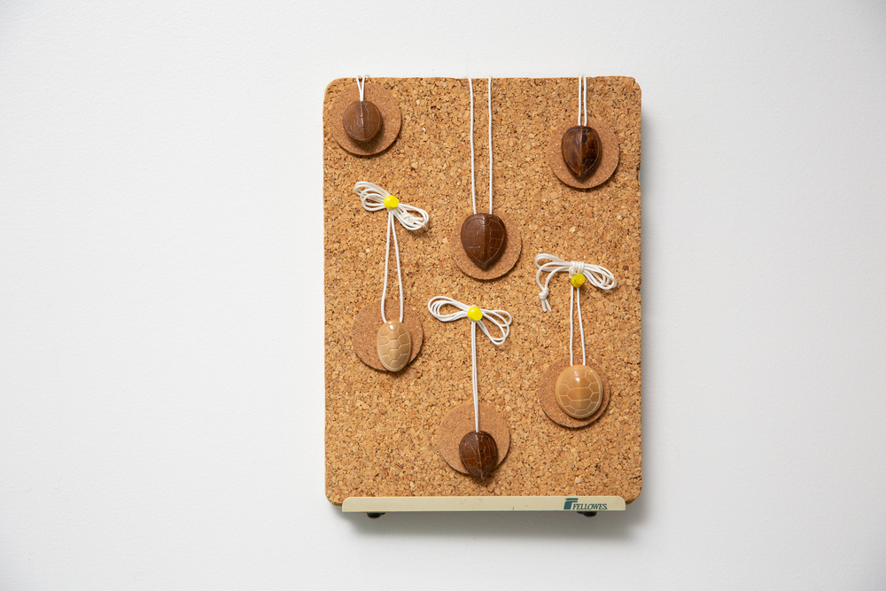 "Siblings (Group of 6 Pendants)" by Gary Hunt