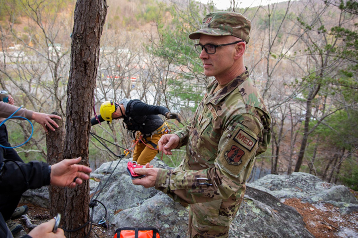The team prepares for a rope rescue. 