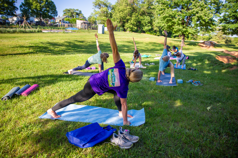 Community Night participants during a yoga activity.