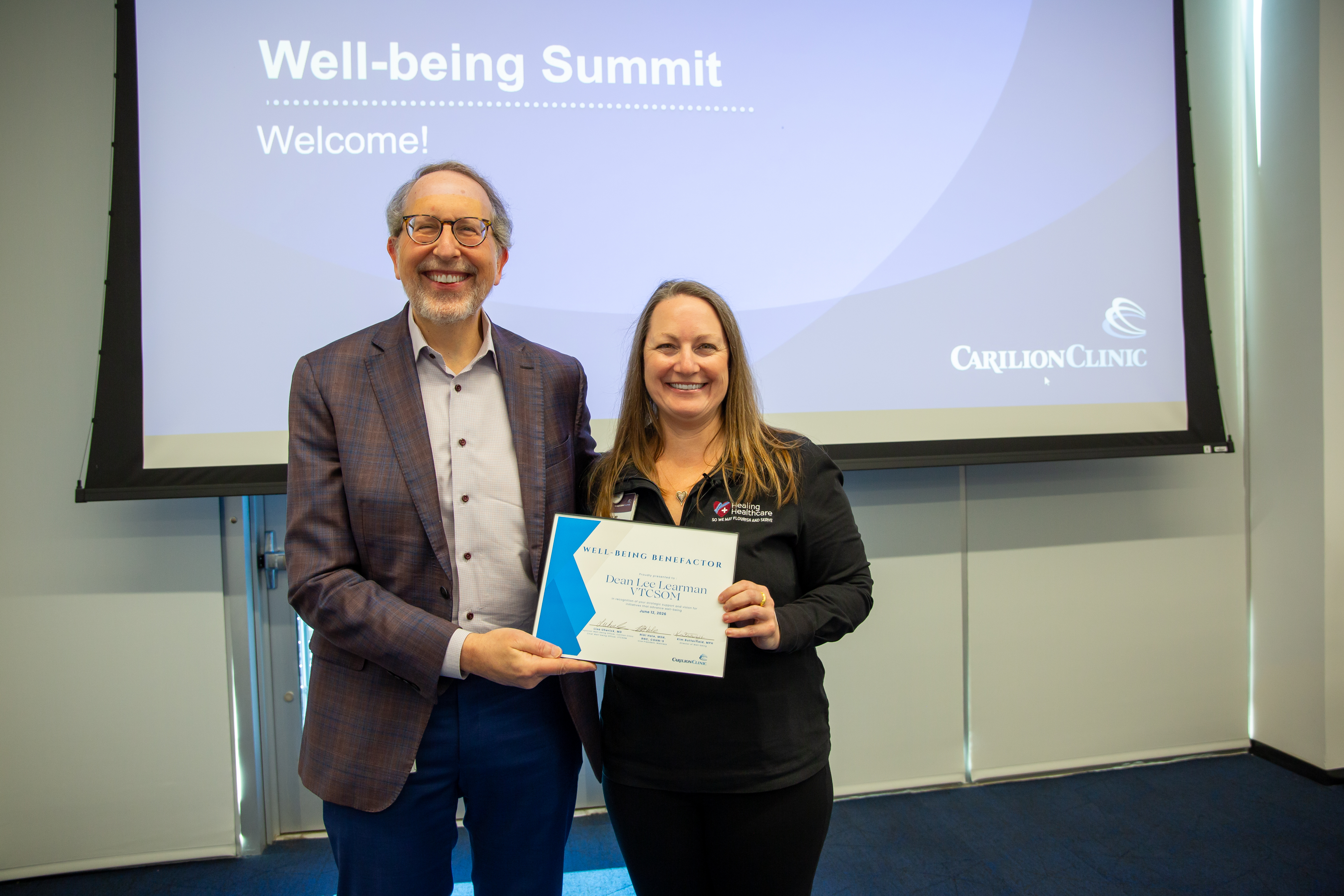 Dean Lee Learman VTCSOM receiving the Well-Being Benefactor Award