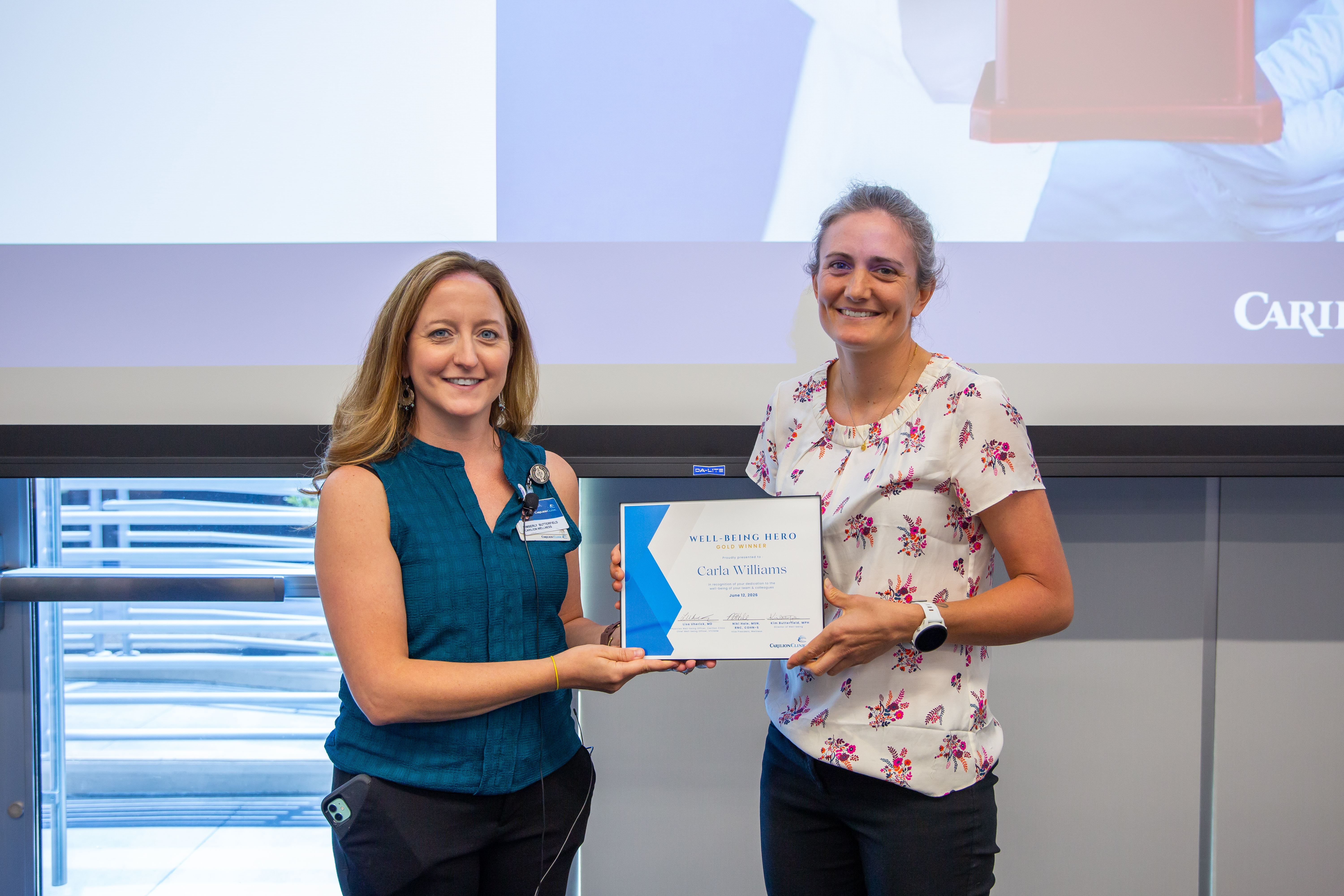 Carla Williams receiving the Well-Being Hero Gold Award