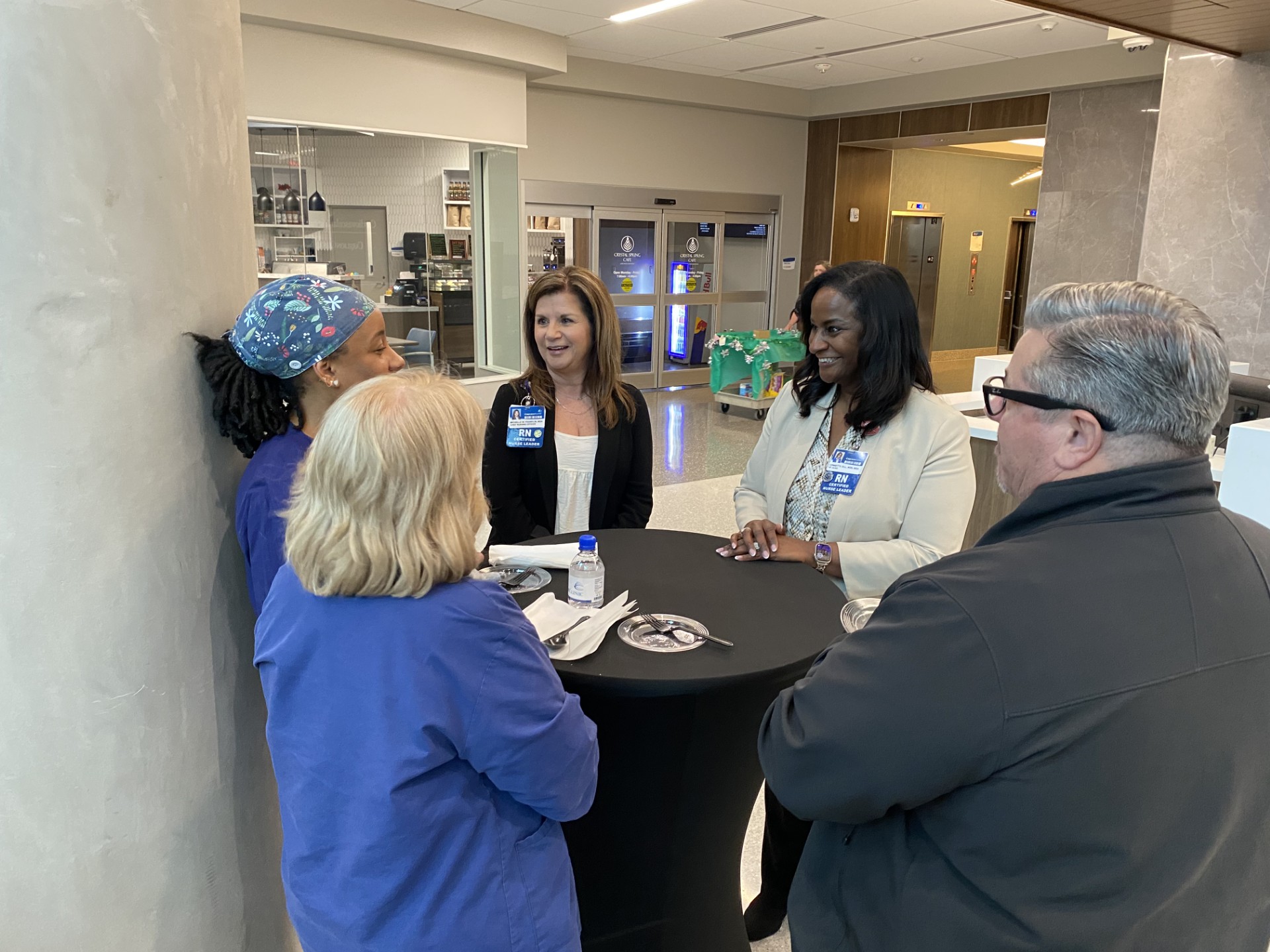 Chief Nursing Officer Michelle Franklin and CMC Assistant Chief Nursing Officer Connette Gill chatting with nurses at a meet-and-greet event.