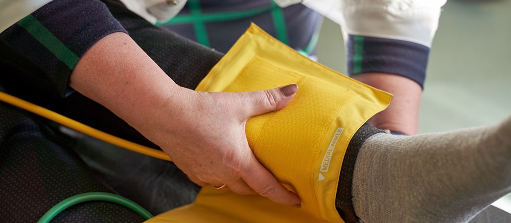 blood pressure cuff on an ankle