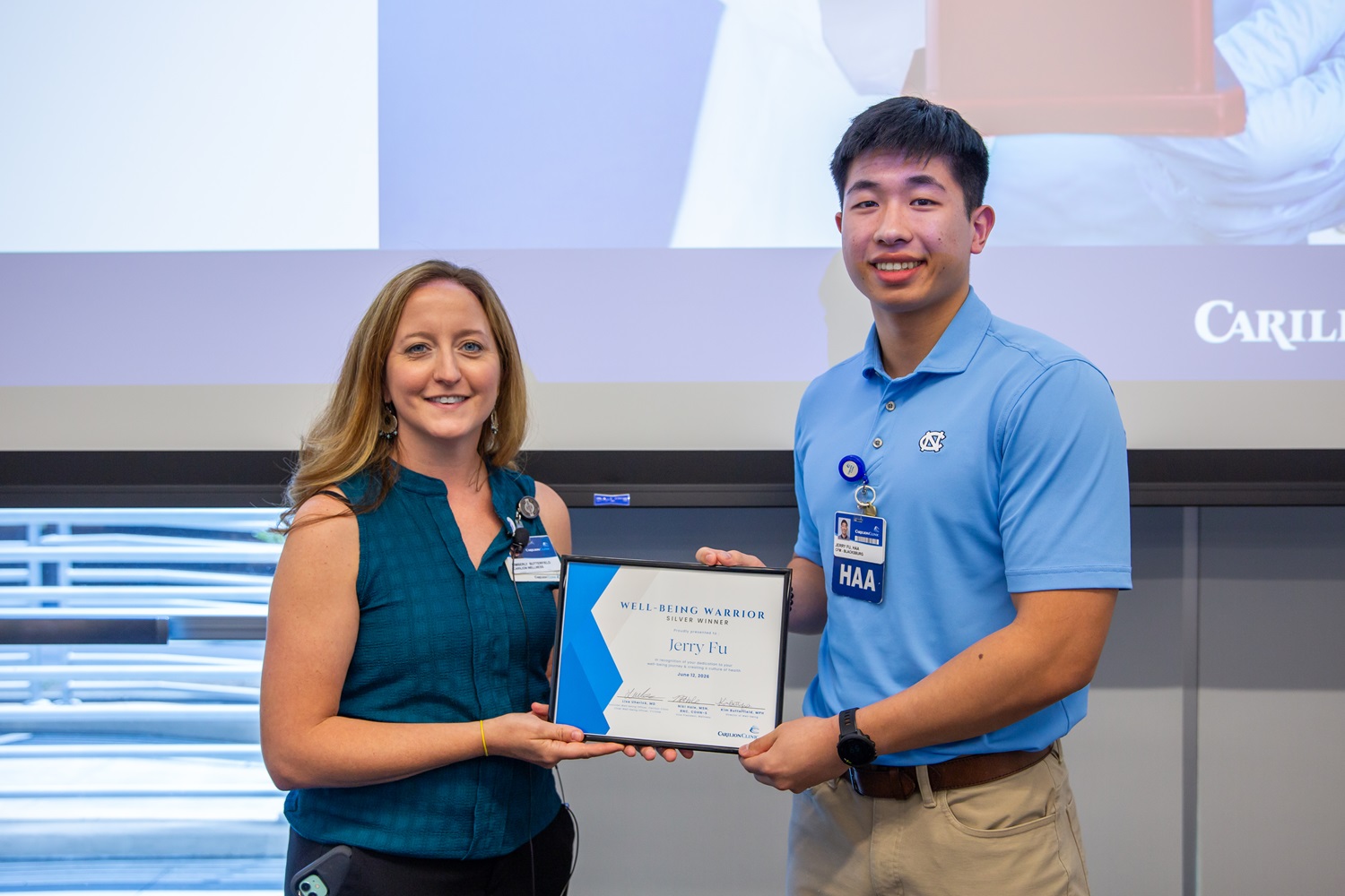 Jerry Fu (right) received the Well-Being Warrior Silver Award.