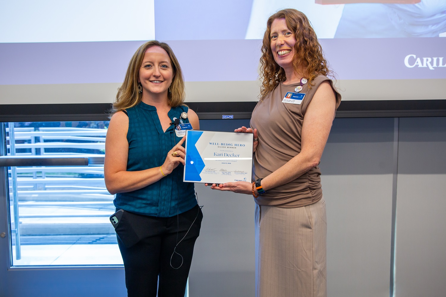 Kari Decker (right) received the Well-Being Hero Silver Award.