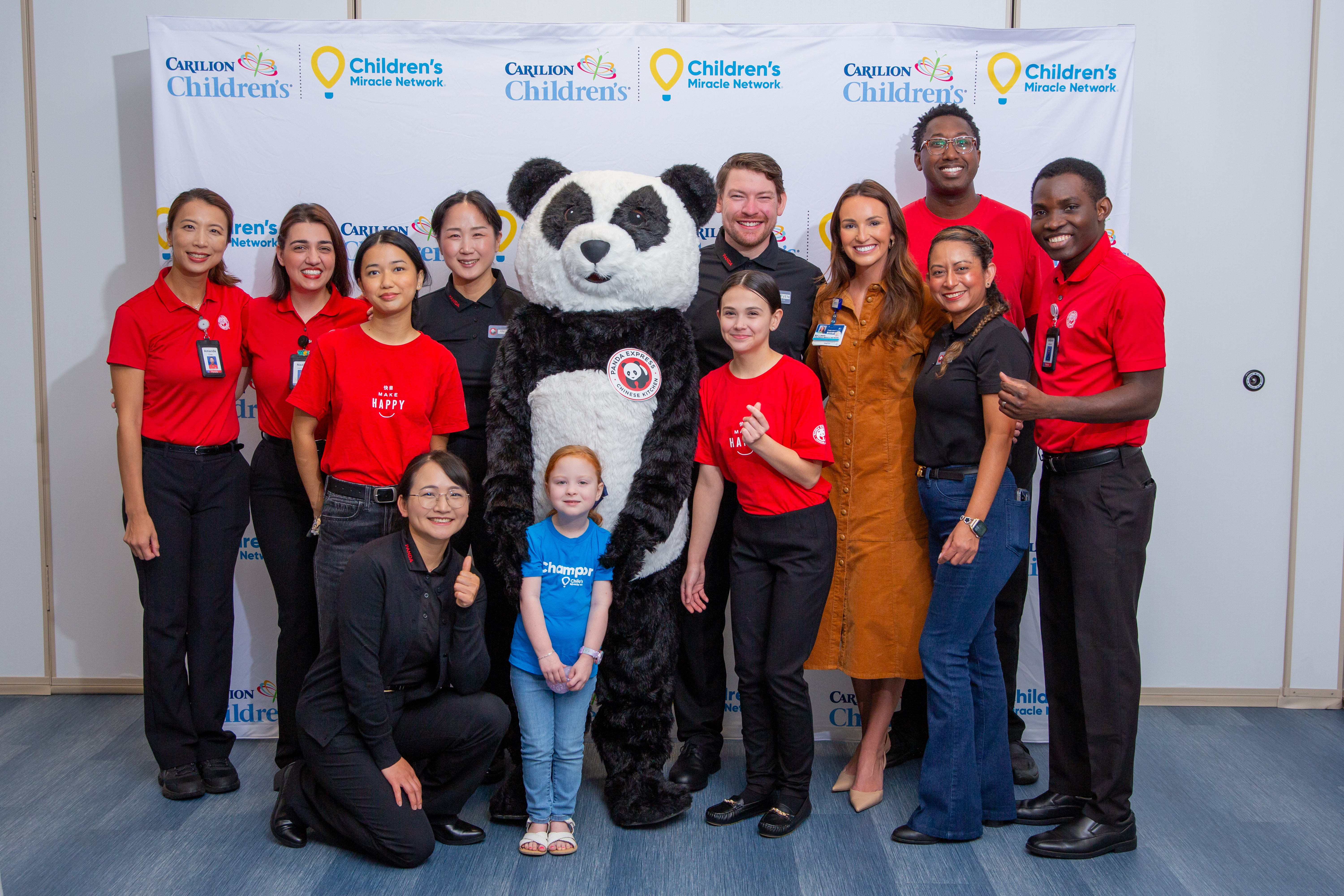 Panda Express associates, mascot, CMN champion Madi Spencer, and Macy Ware