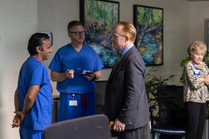 Steve Arner talks with clinicians at CRMH.