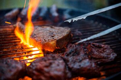 steaks on grill