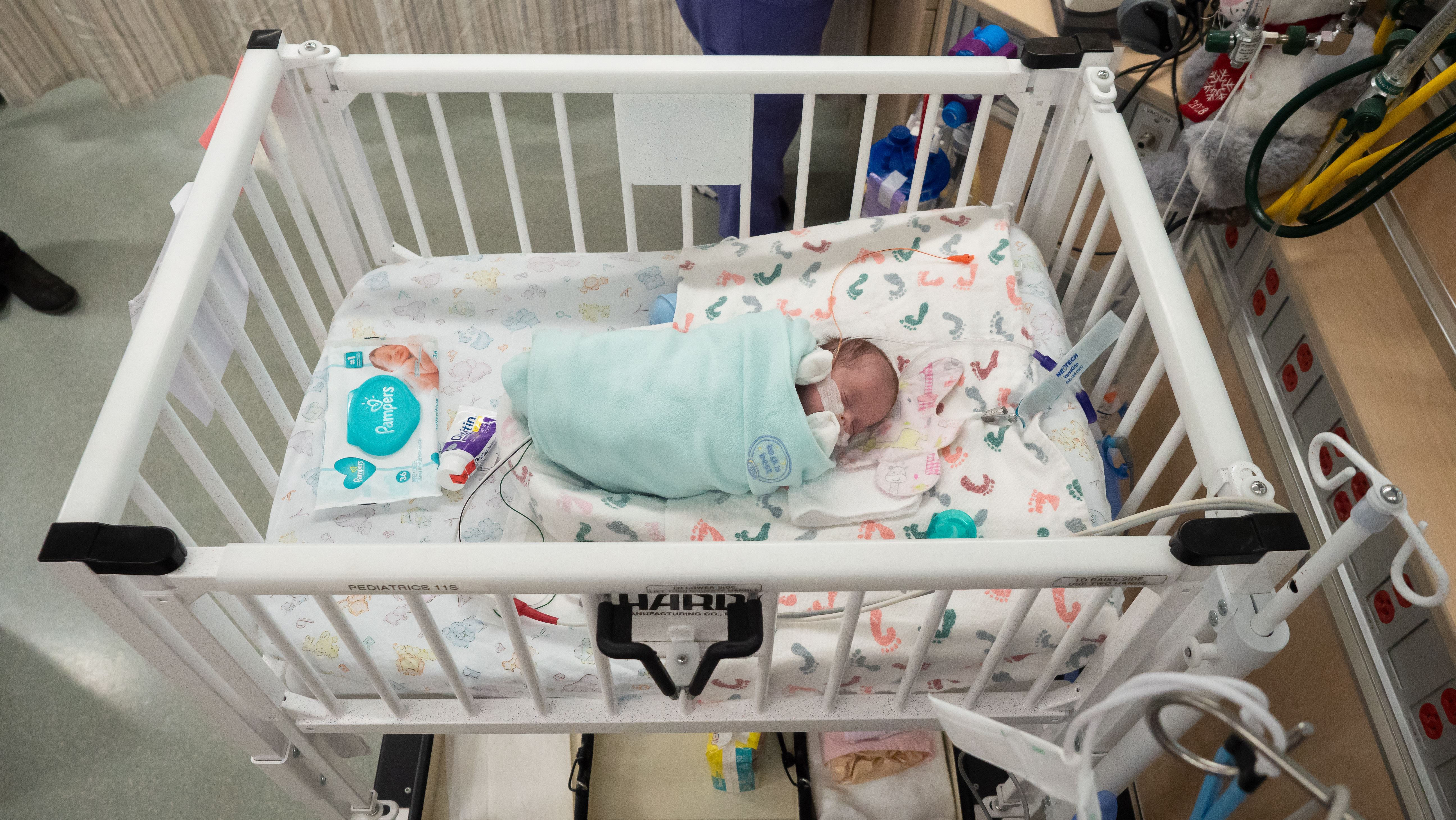 NICU baby in bassinet