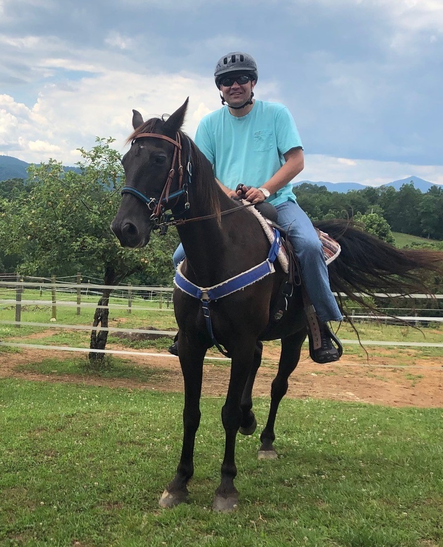 Blake Carothers on horseback