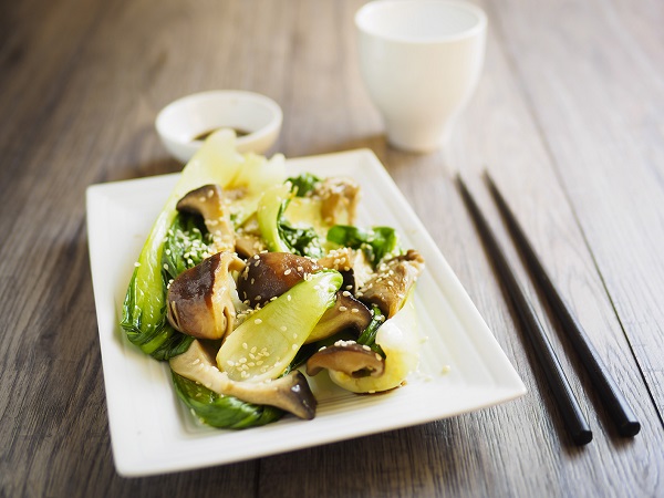stock image of stir fried mushrooms and bok choy
