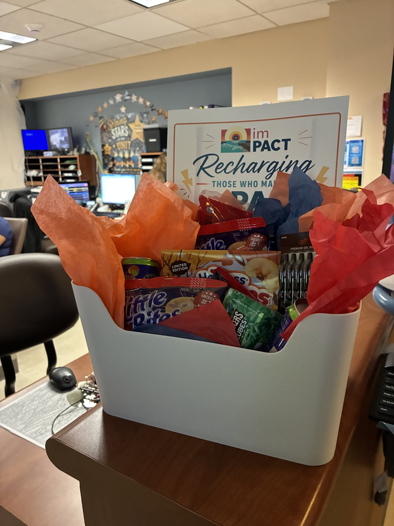 imPACT award celebration basket and sign