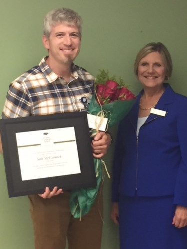 Seth McCormick and award giver