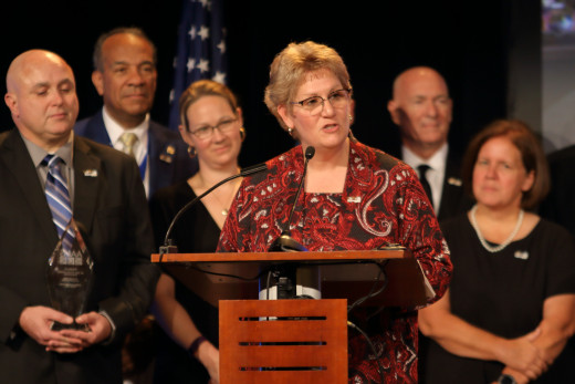 Senior Director Krista Henderson makes her remarks at the awards ceremony in Phoneix, AZ. 