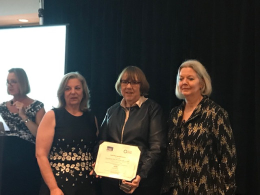 Donna receiving her Fellowship.