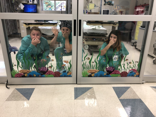 Staff having fun under the sea
