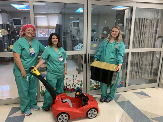 Whitney Ashley, Heather Hopkins and Brittany Lessard show off new peds area